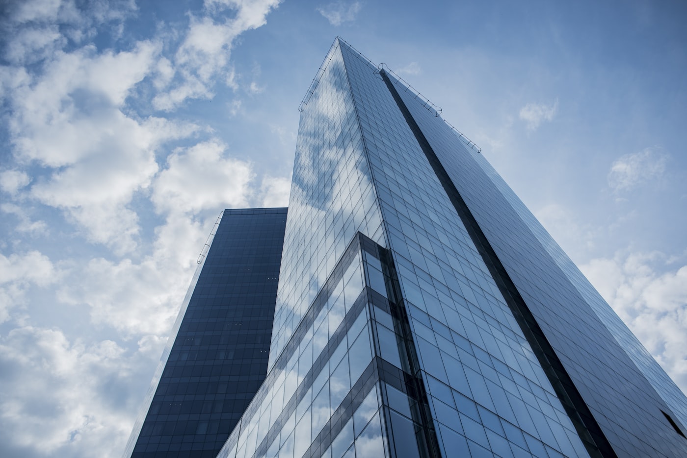 A glass tower seen from below